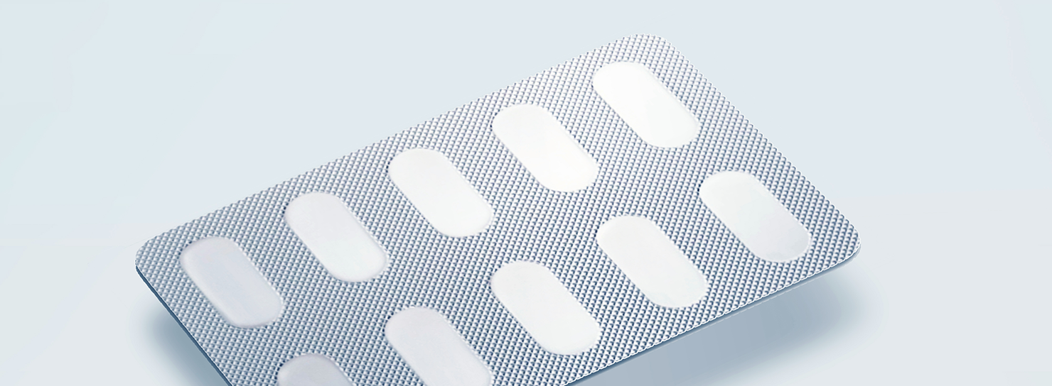 A close up of a blister pack foil