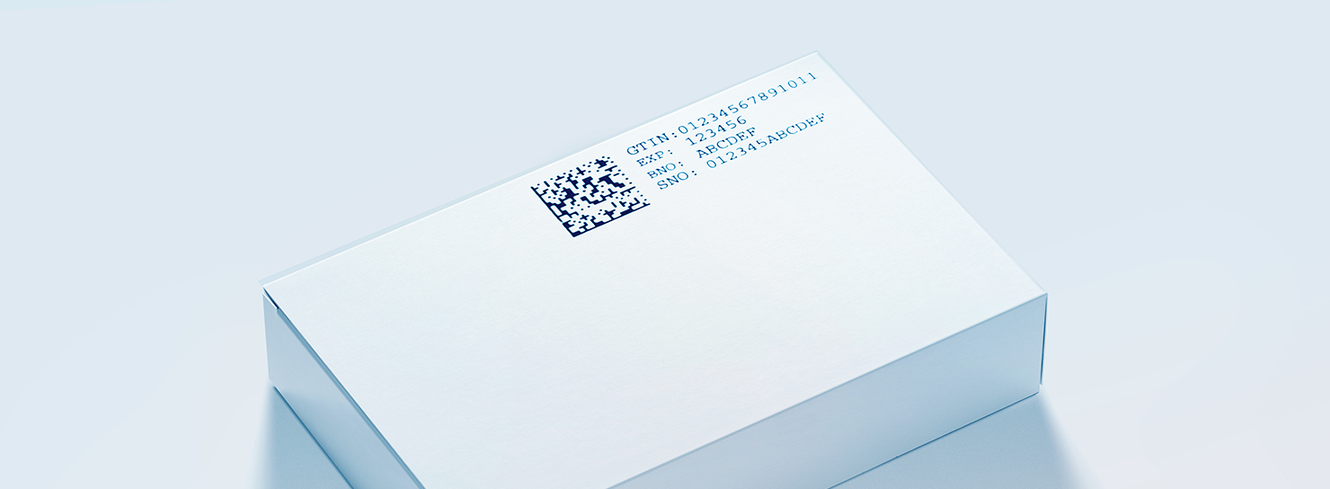 A close up of a carton with serialisation applied